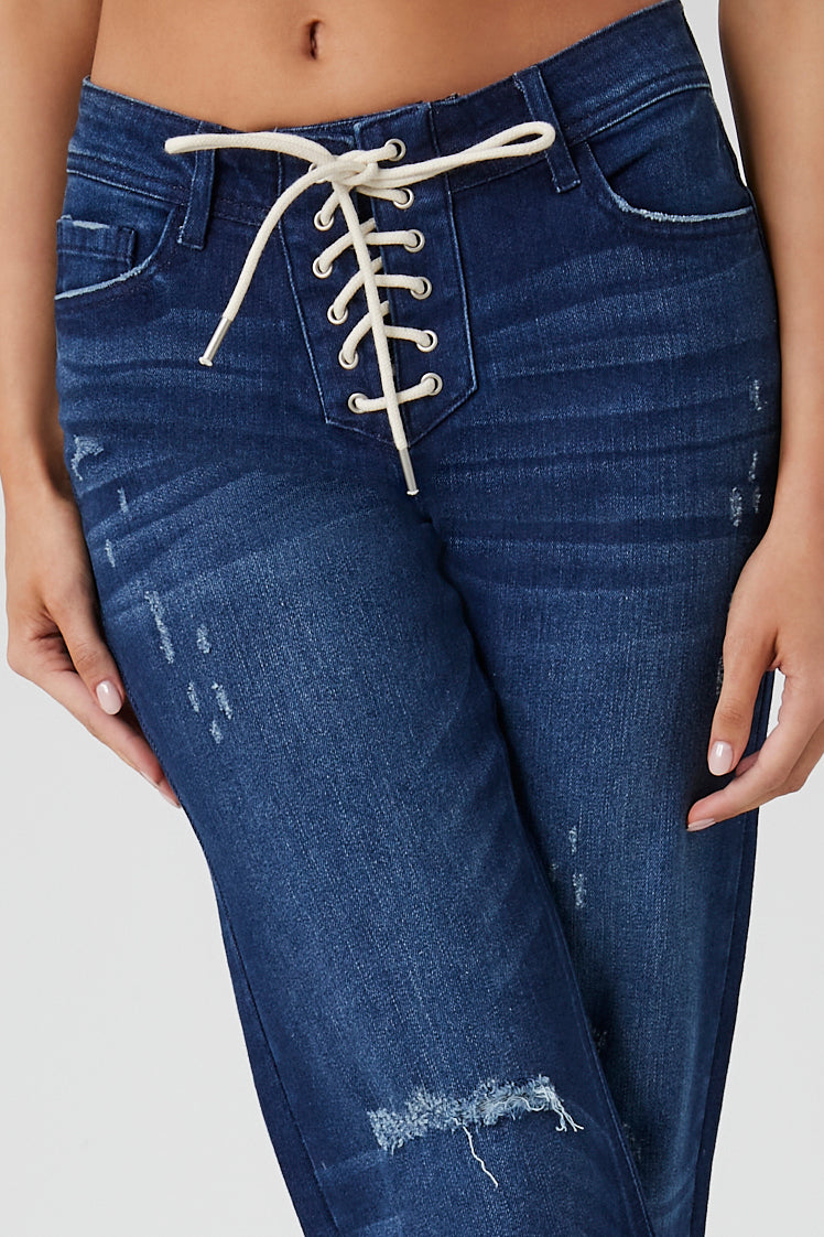 PANTALON DENIM FLARE CON TRENZA