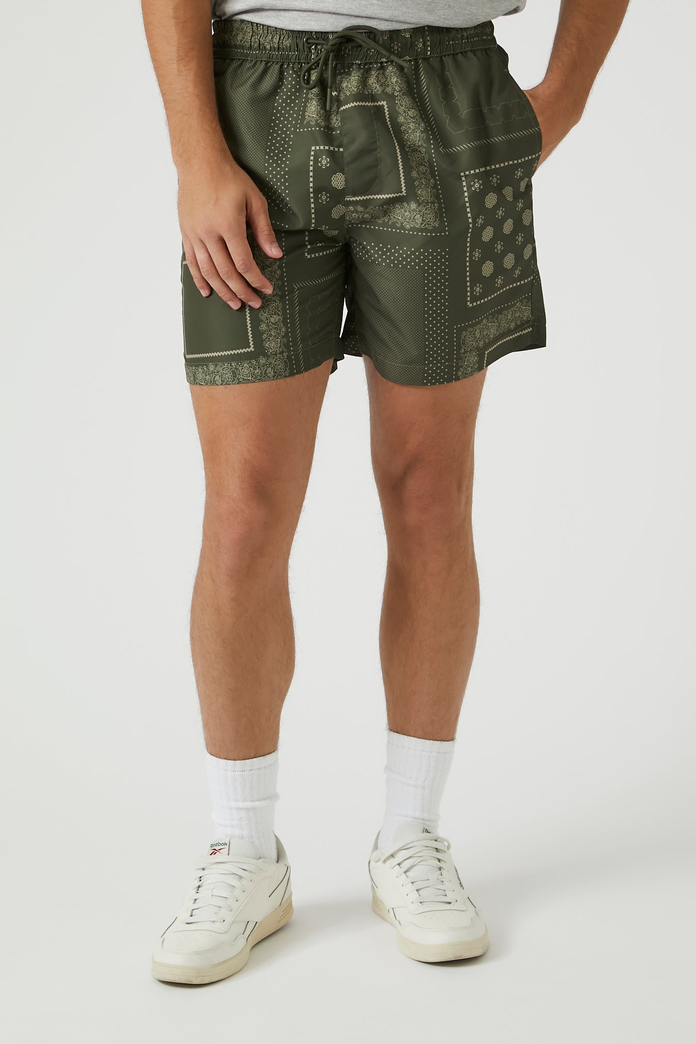 SHORT MALLA CON ESTAMPADO DE FIGURAS
