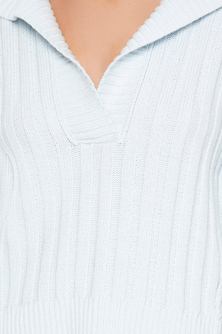 SWEATER TEJIDO CON DETALLE DE SOLAPA