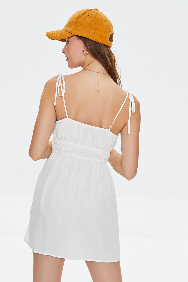 VESTIDO DE CORTE RELAJADO Y DRAPEADO BAJO EL BUSTO