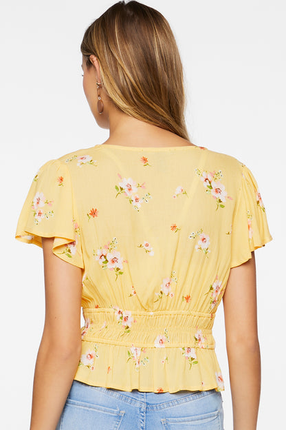 TOP ESCOTE EN V Y ESTAMPADO DE FLORES