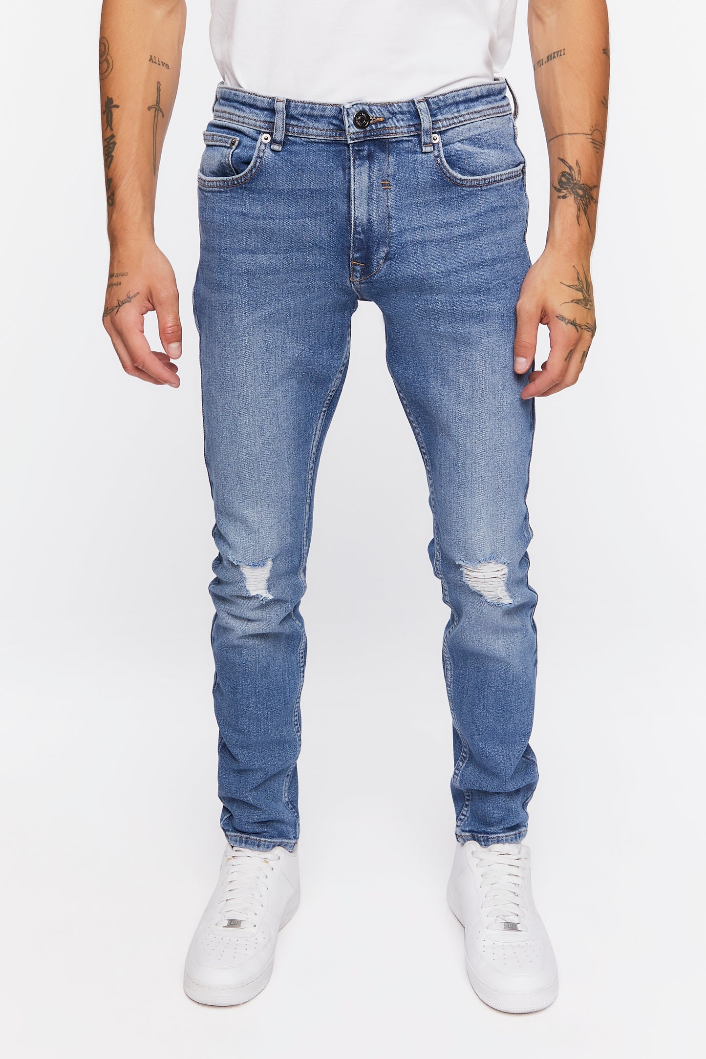 PANTALON DENIM SLIM CON RASGADO