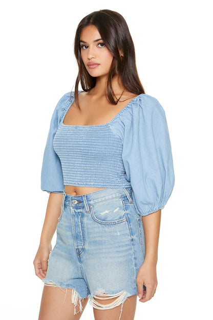 CROP TOP CON MANGAS ABULLONADAS