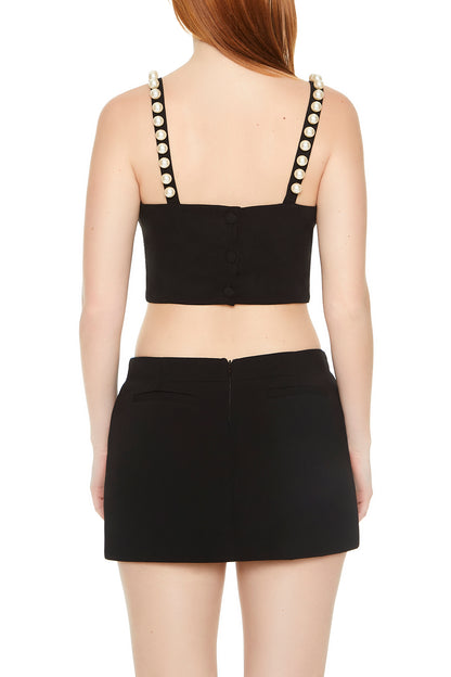 CROP TOP CON PERLAS EN LOS TIROS