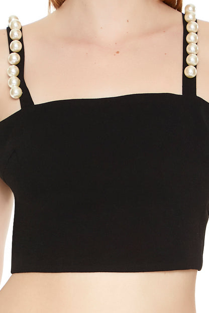 CROP TOP CON PERLAS EN LOS TIROS