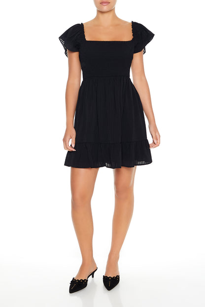 VESTIDO MINI CON MANGAS ABULLONADAS