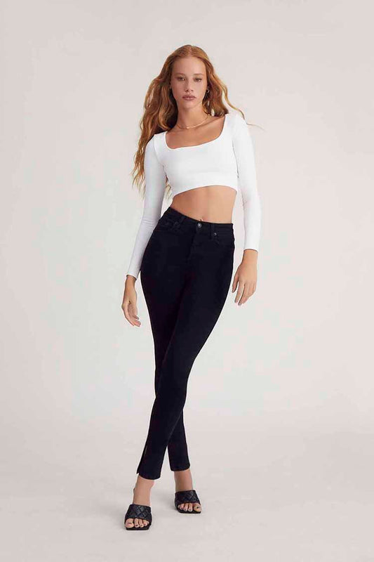 PANTALON DENIM SKINNY CON ABERTURA EN EL BOTA PIE