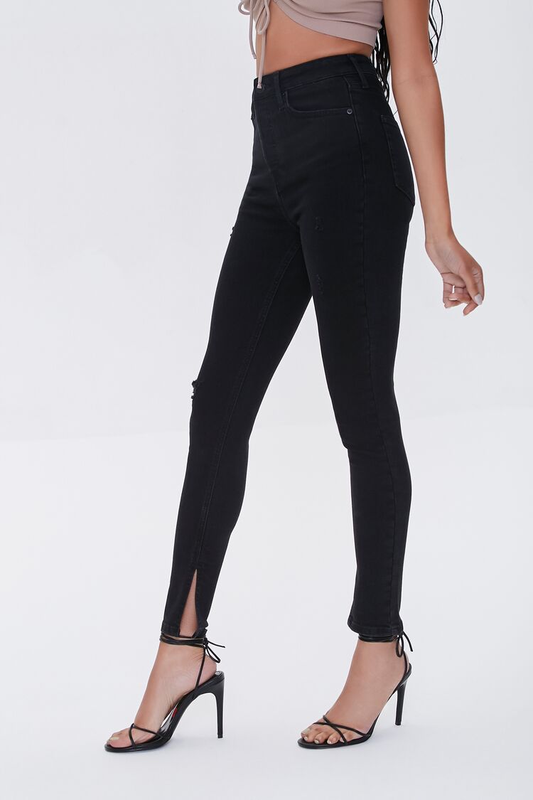 PANTALON DENIM SKINNY CON ABERTURA EN EL BOTA PIE