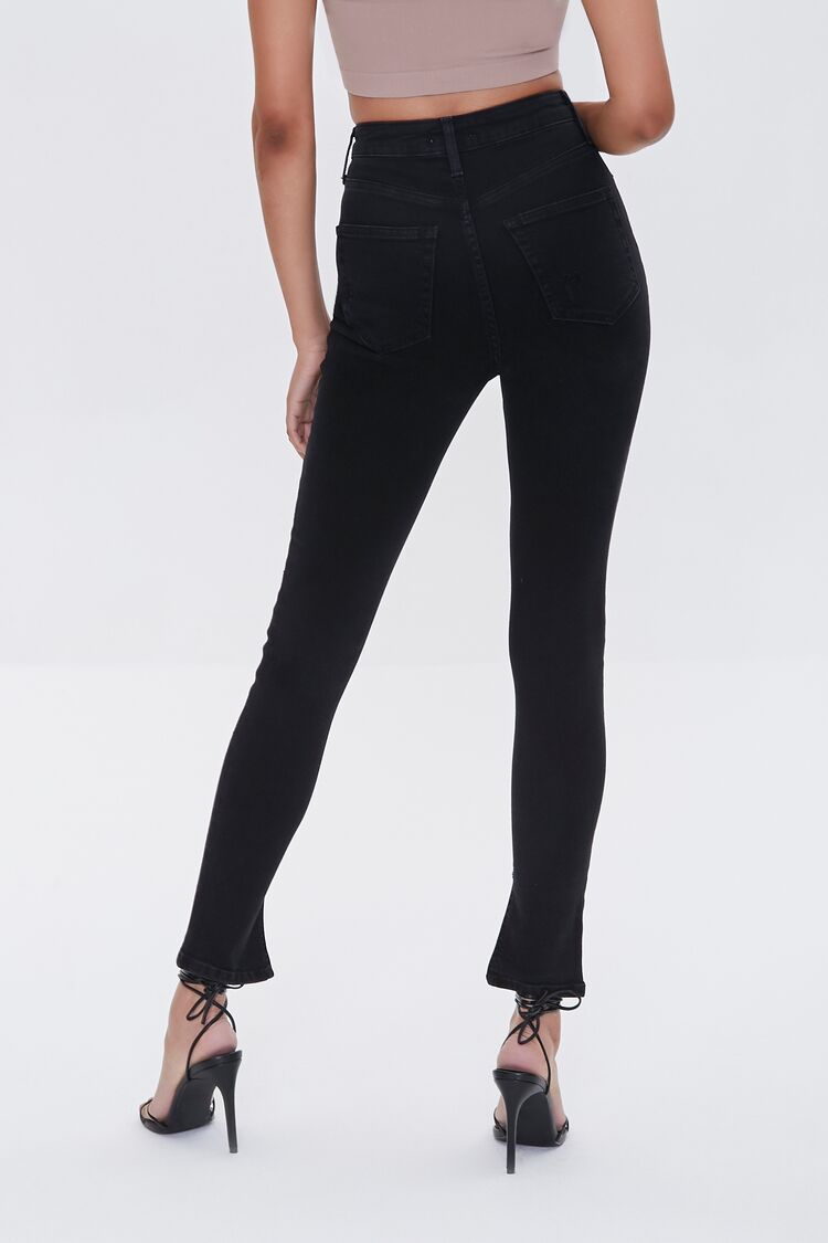 PANTALON DENIM SKINNY CON ABERTURA EN EL BOTA PIE