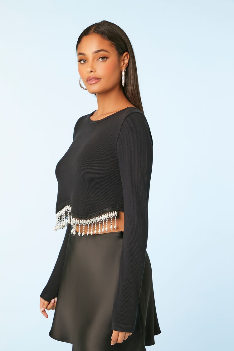 CROPPED TOP CON DETALLES DE PERLAS EN LA CINTURA