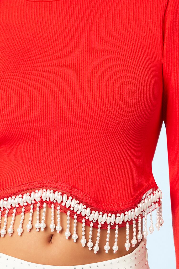 CROPPED TOP CON DETALLES DE PERLAS EN LA CINTURA